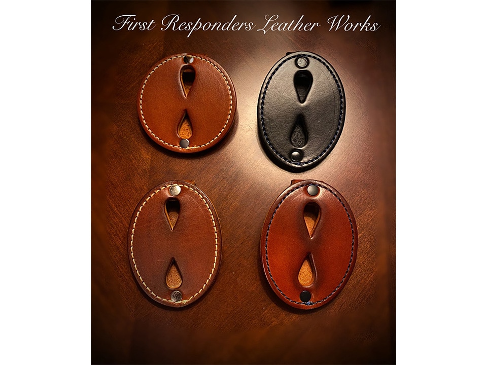 Four Badge Holder (Loop) key holders in brown and black leather are displayed on a wooden surface, with "First Responders Leather Works" text above.